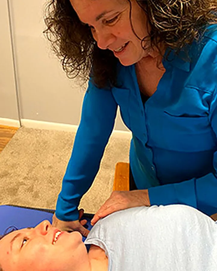 Dr. Kim Pollack treating a patient